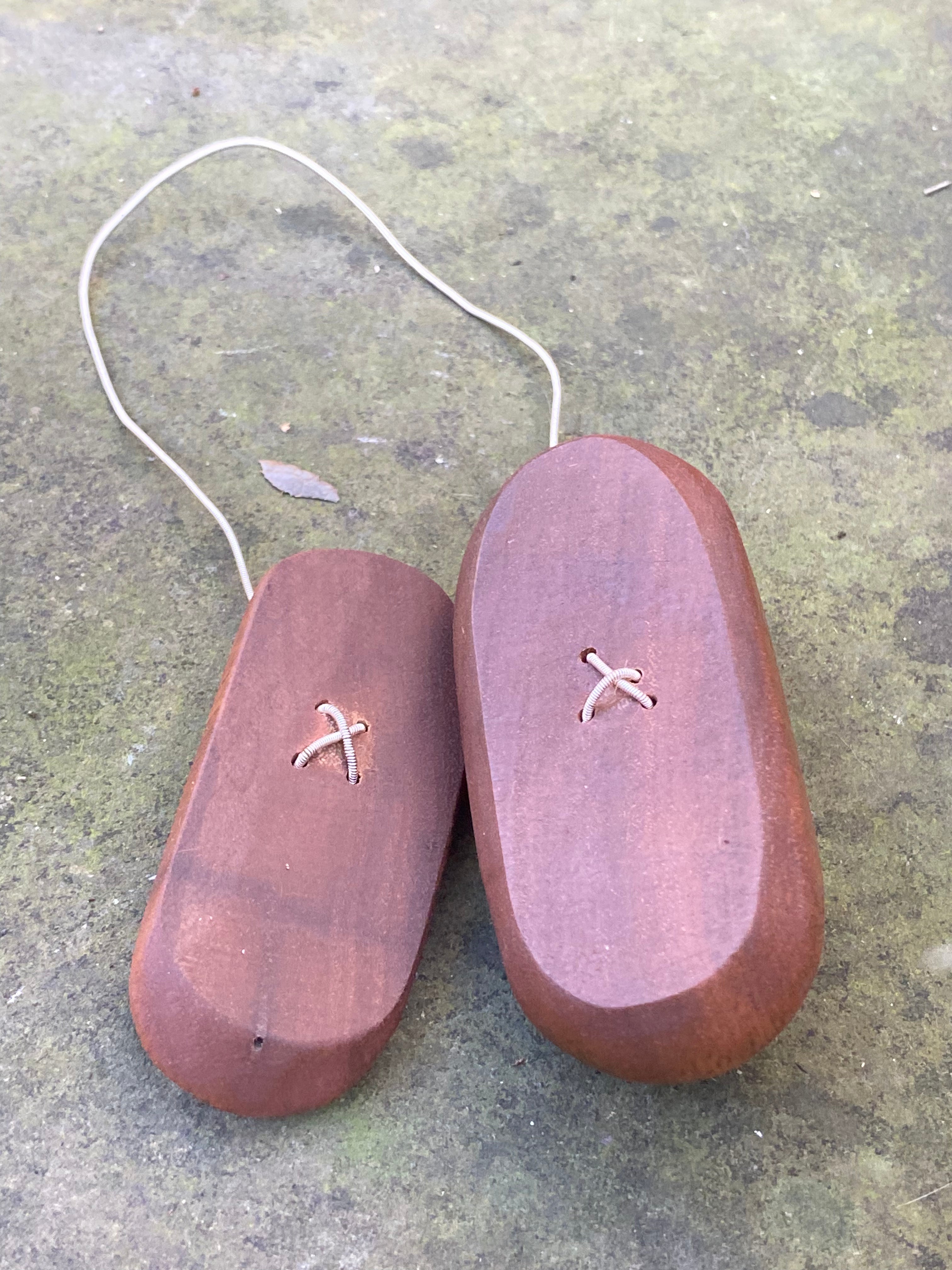 chunky big wire cutters made from jarrah wood and old guitar strings